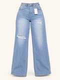 Jeans rectos en denim claro con detalles destroyed