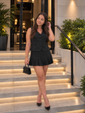 Set negro chaleco y falda plisada